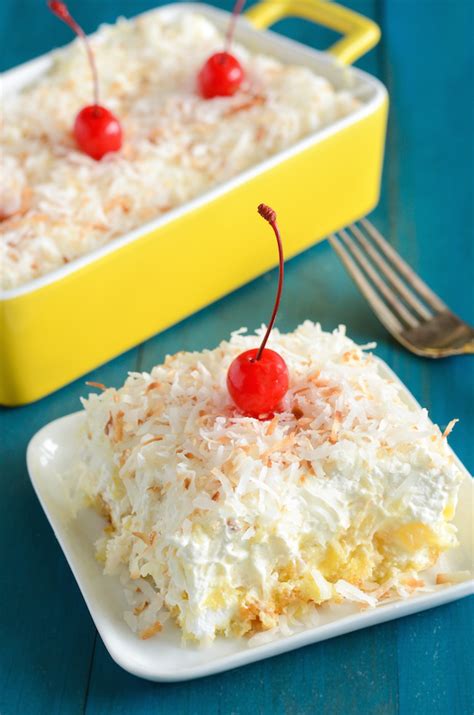 Holiday baking 2020 season's best treats recipes. Paula Deen-Inspired Pineapple Coconut Cake | TheBestDessertRecipes.com