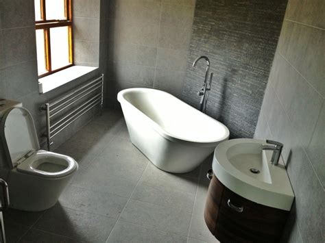 • you can still stay monochromatic. My New Bathroom: feature wall with slate tiles, light grey ...