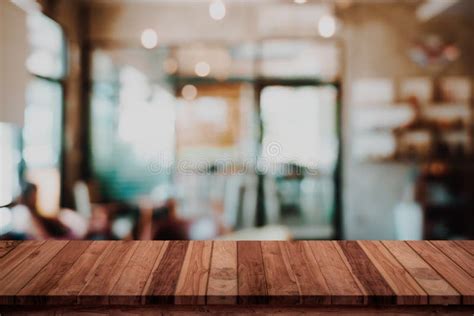 Empty Wood Table With Blur Cafe Or Coffee Shop Background Stock Image