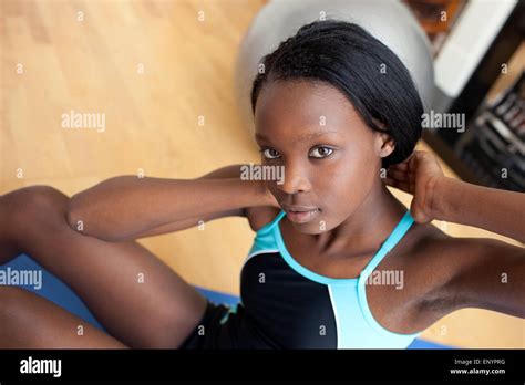 Beautiful Woman In Gym Outfit Doing Sit Ups Stock Photo Alamy