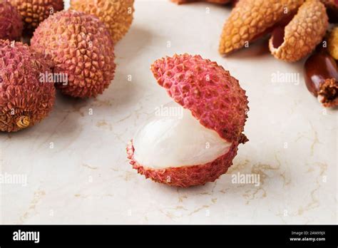 Close Up Of Juicy Ripe Lychee Fruit Litchi Chinensis On A White Kithen Table Fruits And