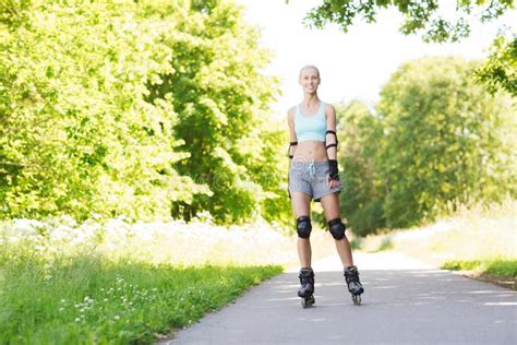 Happy Young Woman In Rollerblades Riding Outdoors Stock Image Image