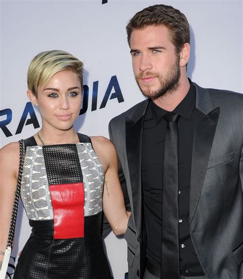 Miley Cyrus And Liam Hemsworth Spotted Kissing In Australia Daily Dish