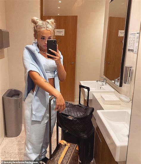 tammy hembrow shows off her washboard abs in a crop top as she jets to milan fashion week