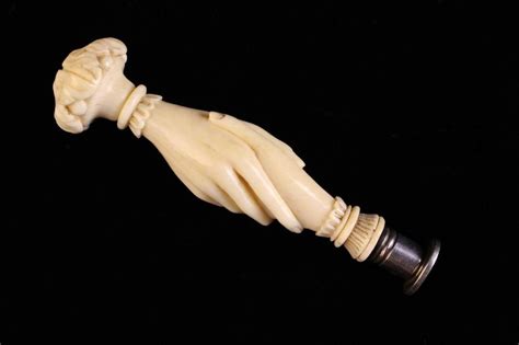 A Victorian Ivory Handled Seal Carved In The Form Of Clasped