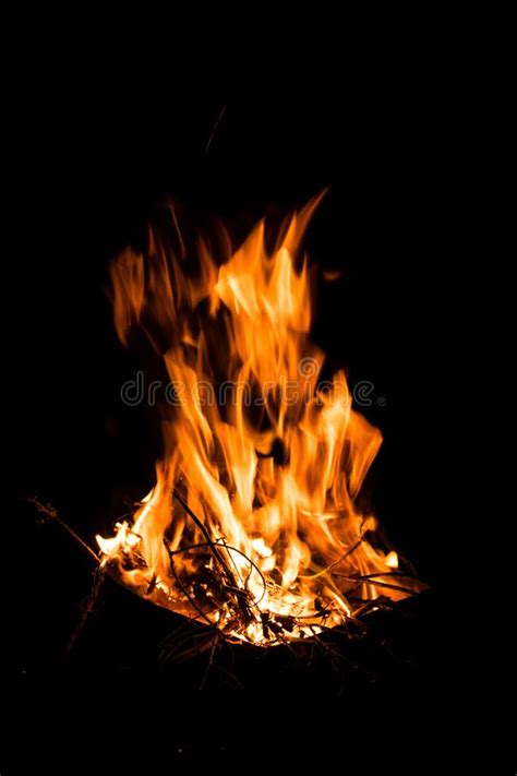 Great Bright Flame Of Fire Burning Firewood In The Fire At Night The