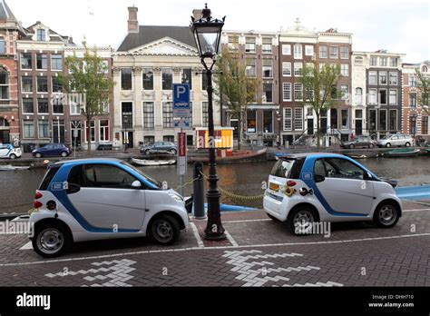 Electric Cars Charging In Amsterdam The Netherlands Stock Photo