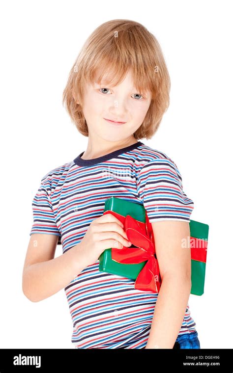 Boy Holding A Present Isolated On White Stock Photo Alamy