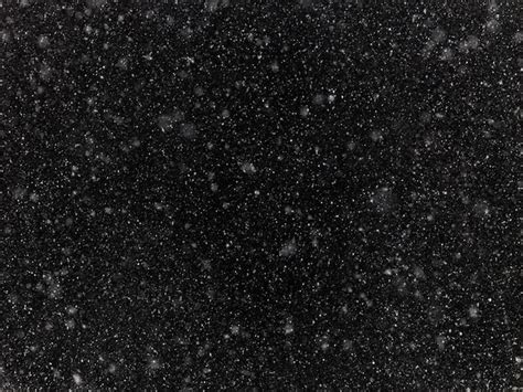 Premium Photo Texture Of Falling Snow Flakes On A Black Wall