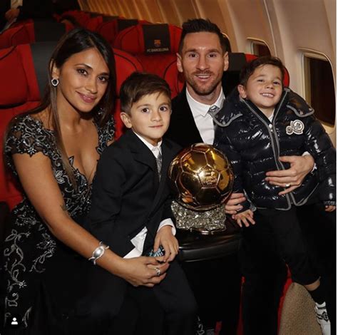 They have three kids together, a happy family indeed. Lionel Messi shows off his 6th Ballon d'Or trophy as he ...