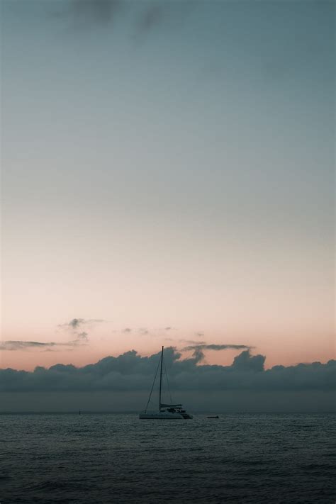 Boat Sail Ocean Clouds Horizon Twilight Hd Phone Wallpaper Peakpx