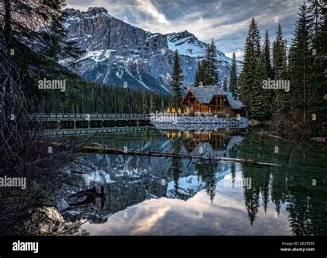 Magnificent Scenery Of Emerald Lake With Bridge Over Water And Wooden