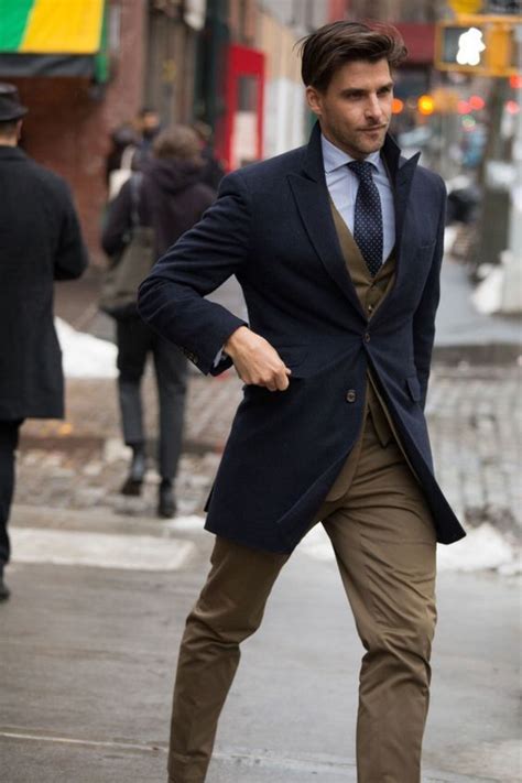 Marry A Navy Overcoat With A Brown Suit For A Sharp Fashionable Look
