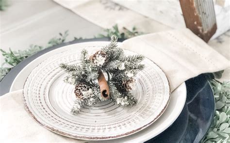 An Easy Winter Table Setting With Navy Chargers White Dishes And