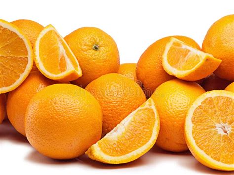 An Abundance Of Citrus Studio Shot Of A Pile Of Oranges Against A