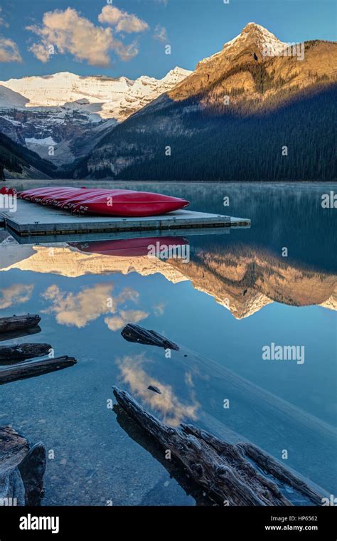 Red Canoes On The Dock At Lake Louise In Banff National Park Alberta