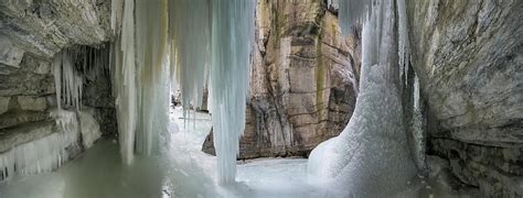 Majestic View Of Frozen Waterfall At Maligne Canyon Photograph By Cavan