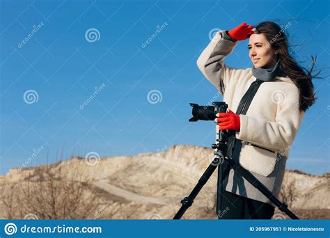 Female Nature Photographer Taking Pictures In Nature Stock Image