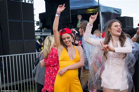 Cox Plate Revellers Seen With Umbrellas Ponchos To Protect From The Rain Express Digest