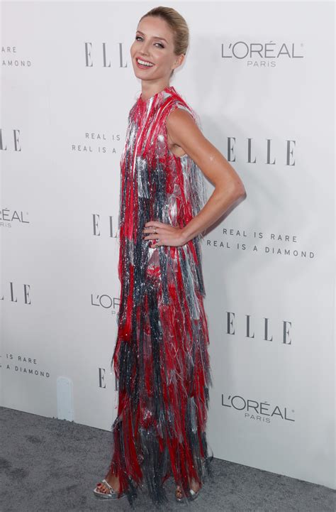 Annabelle Wallis In A Red And Silver Tasseled Dress By Erdem About Her