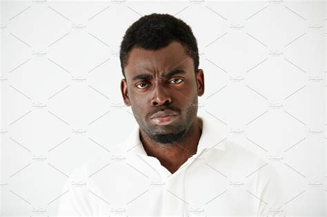 Close Up Shot Of Angry Grumpy Or Pissed Off African American Man With