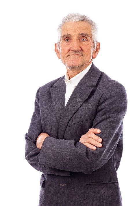 Elderly Man With Arms Folded Looking Down Lost In Deep Thought Stock