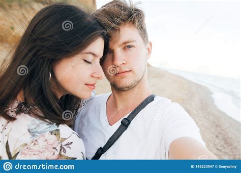 Stylish Hipster Couple Taking Selfie On Beach At Evening Sea Summer Vacation Stock Image