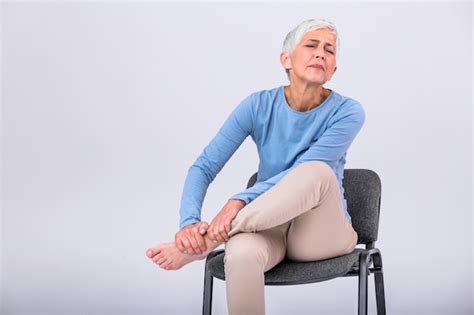 Premium Photo Senior Woman Suffering From Pain In Leg At Home