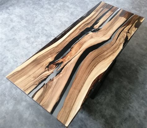 Show hows to pour epoxy over a wood table or bar top area. Exklusive Tische Neuschmid Interieur Design