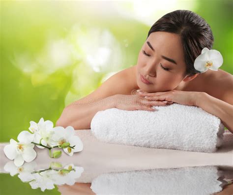 Beautiful Asian Woman Lying On Massage Table Spa Treatment Stock Image Image Of Green Pretty