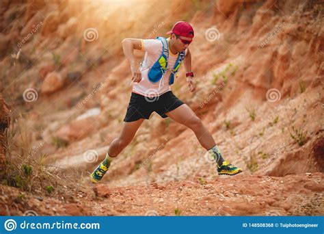 A Man Runner Of Trail And Athlete S Feet Wearing Sports Shoes For