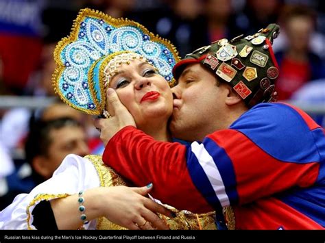 russian fans kiss during the