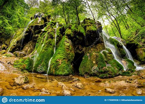 Beautiful Beusnita Waterfall In The Forest With Green Moss Stock Photo