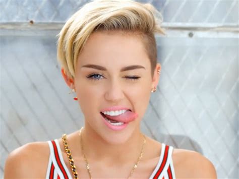 miley cyrus shows off sexy side rap skills in new 23 video cbs news