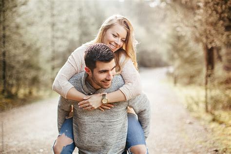 Young Good Looking Couple Laughing Together By Stocksy Contributor Luke Liable Stocksy