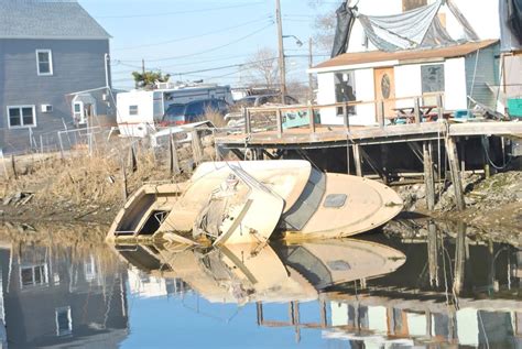 Sailors Decry Boats Sinking Into Creek Queenswide
