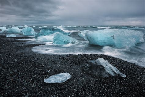 Oc Icebergs Washing Up On A Black Volcanic Sand Beach Across The Ring Road From The Glacial