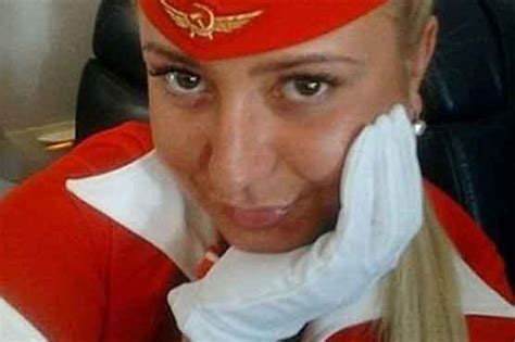 Russian Air Hostess Sacked For Obscene Gesture