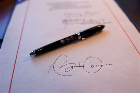 The other is a facsimile, the work of a mechanical device known as an the signature on the right contains is the real thing. File:Barack Obama signature and pen.jpg - Wikimedia Commons