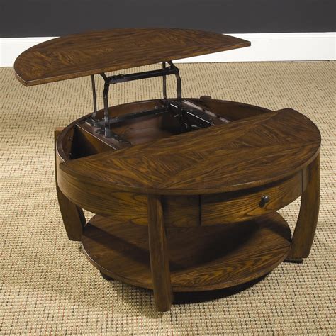 You can use it as a dinner tray or a makeshift workstation for you laptop. Hammary Concierge Round Lift-Top Cocktail Table with Lower ...