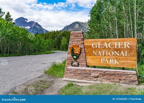 Welcome Sign At The Entrance To Glacier National Park Editorial Stock