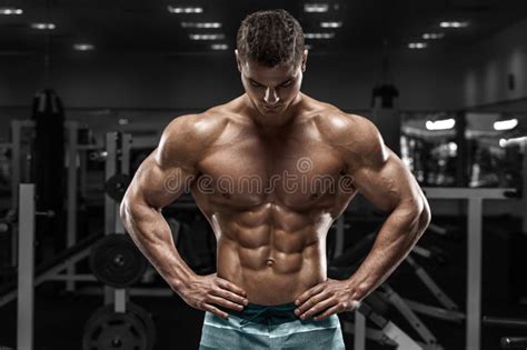 Muscular Man In Gym Shaped Abdominal Strong Male Naked Torso Abs Working Out Stock Photo