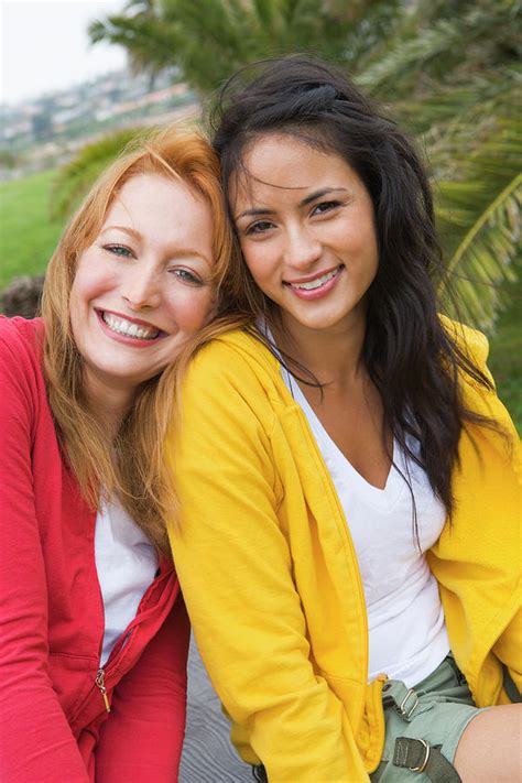 Two Smiling Women In Their Late 20s Photograph By Ty Milford