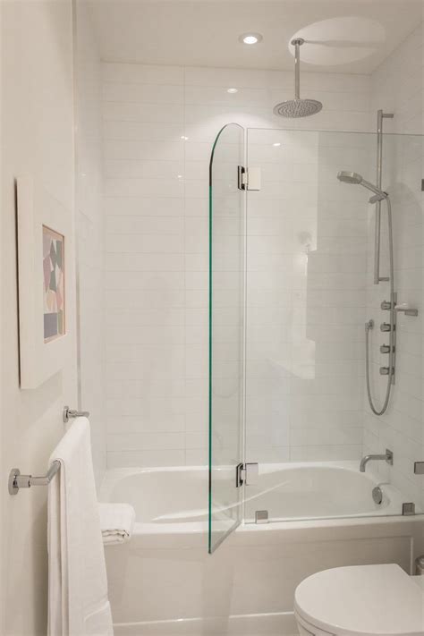 Frameless sliding bathtub door featuring 3/8 in. Greg & Rob's Sky Suite | Bathroom tub shower, Tub with ...