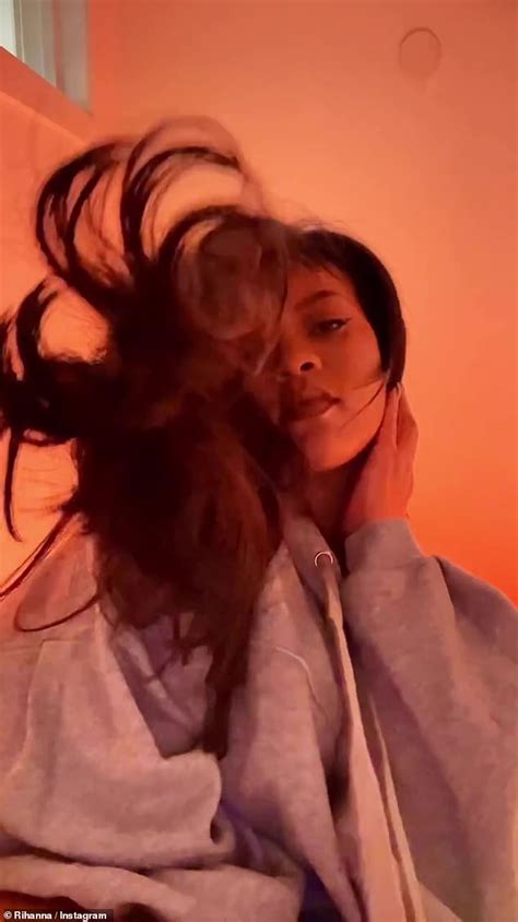 Rihanna Puts On A Cheeky Display In A Light Grey Savage X Fenty Hoodie
