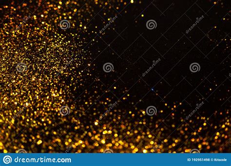 Sparkling Gold Glitter On A Black Background Magic Abstract Background