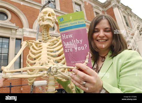 Nutritionist And Organiser Tanya Carr Poses With A Model Skeleton Outside Olympia Event Centre