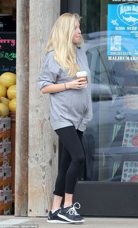 Pregnant Leah Jenner Shows Off Baby Bump In Sweats With Husband Brandon