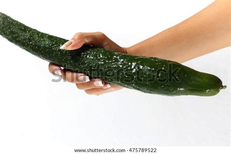 Beautiful Womans Hand Holding Big Cucumber Stock Photo
