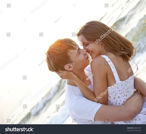Couple Kissing At Sunrise Stock Photo Shutterstock